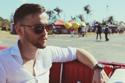 Close-up of young man wearing sunglasses