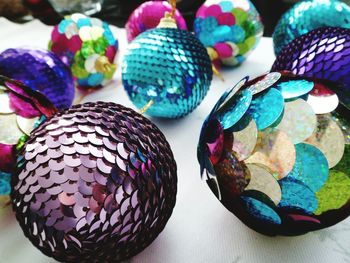 High angle view of colorful baubles on table