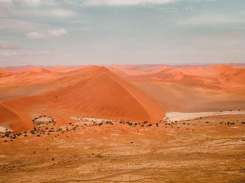 Scenic view of desert against sky