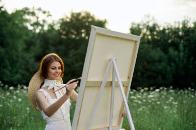 Young woman using mobile phone