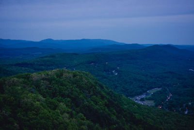 Scenic view of landscape against blue sky