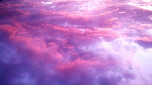 Low angle view of clouds in sky during sunset