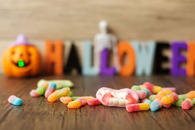 Close-up of multi colored candies on table