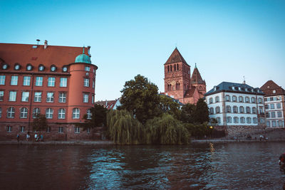 View of buildings against blue sky