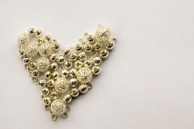 Close-up of heart shape against white background