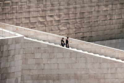 Man and woman on staircase