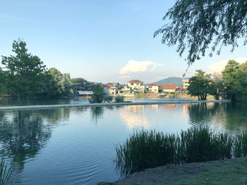 Scenic view of town against sky