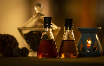 Close-up of wine bottles on table