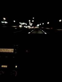 Cars on street at night