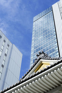 Low angle view of skyscrapers against sky