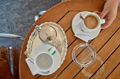 High angle view of coffee cup on table