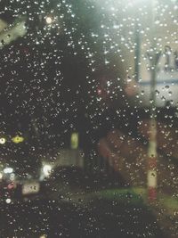 Full frame shot of water drops on window