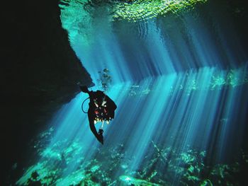 Scuba diver swimming underwater