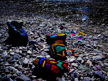 Close-up of multi colored pebbles on beach