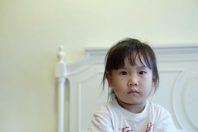 Portrait of cute girl at home