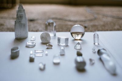 Close-up of crystal objects on table