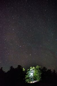 Low angle view of stars in sky at night