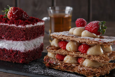 Close-up of cake slices in plate on table