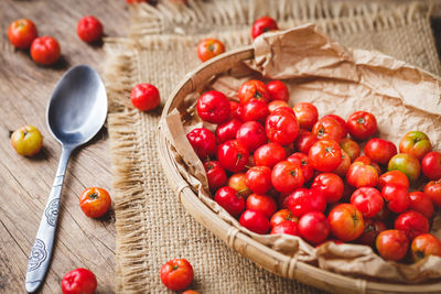 High angle view of cherry tomatoes on table