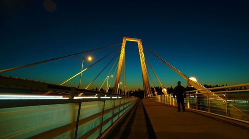 View of suspension bridge at night