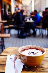 Close-up of coffee served on table