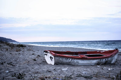 Boats moored in sea