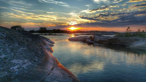 Scenic view of sunset over sea