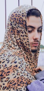 Close-up of man wearing scarf outdoors
