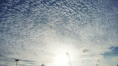 Low angle view of street light against sky