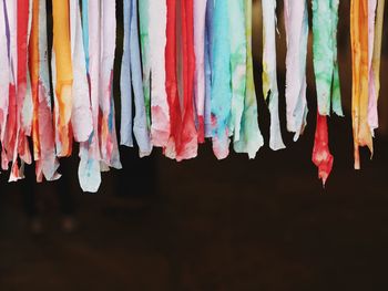 Close-up of multi colored clothes hanging