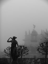 Statue of liberty during foggy weather