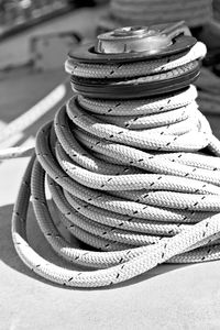 Close-up of rope tied up of metal