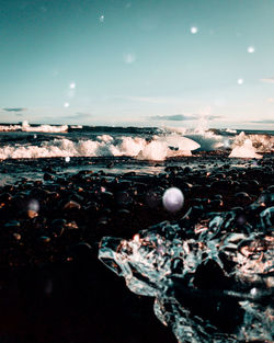 Close-up of pebbles on beach