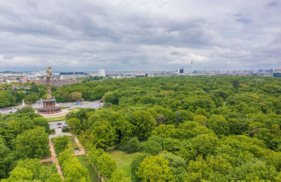 High angle view of trees and buildings against sky