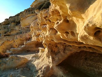 Scenic view of rock formations against sky