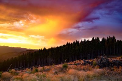 Scenic view of dramatic sky during sunset