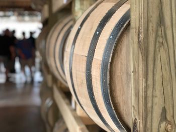 Close-up of barrels in winery