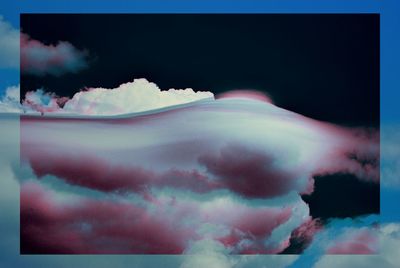 Digital composite image of cloudscape against sky