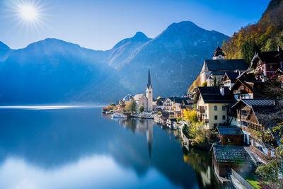 Panoramic view of buildings and mountains against sky