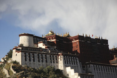 Low angle view of buildings against sky