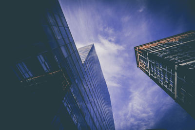 Low angle view of modern building against sky. 

berliner tor center in hamburg, germany.
