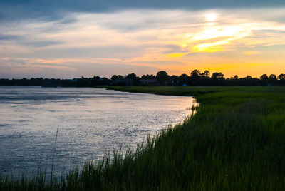 Scenic view of landscape at sunset