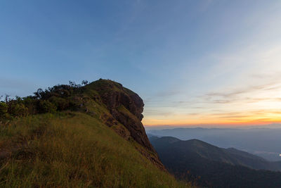 Scenic view of mountain against sky during sunset