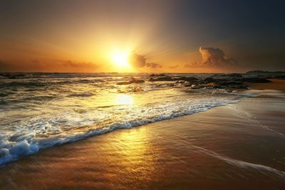 View of beach at dusk