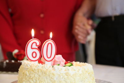 Close-up of birthday cake on table