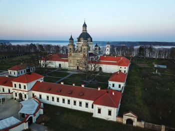 High angle view of townscape by buildings against sky