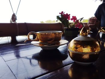 Close-up of coffee cup on table