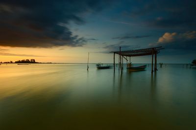 Scenic view of sea against sky during sunset