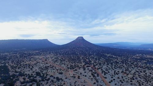 Scenic view of mountain range against sky