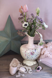 Flowers in old jug